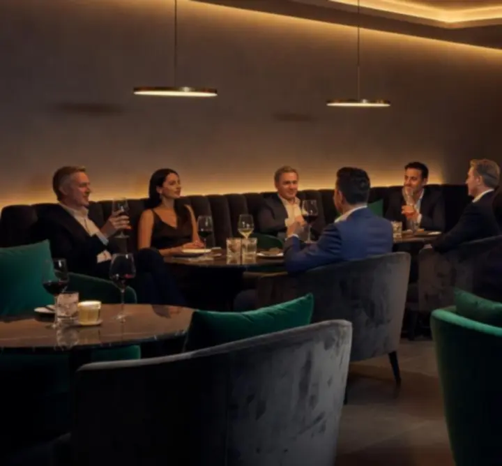 Lounge space transitioning from dining mood to nightlife ambiance.